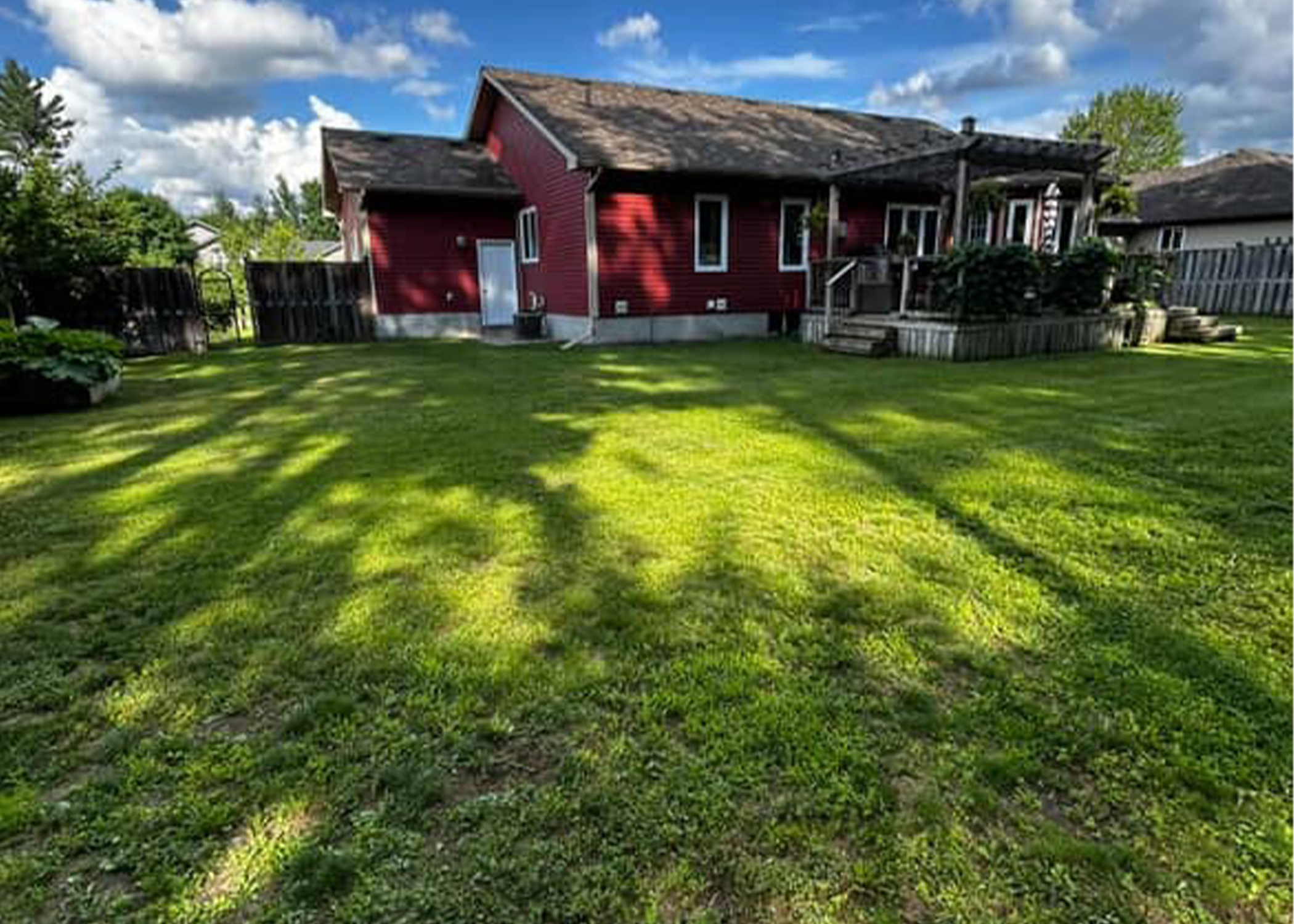 A lawnmower cutting grass